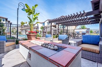 Seating by fire pit | Ageno Apartments in Livermore, CA